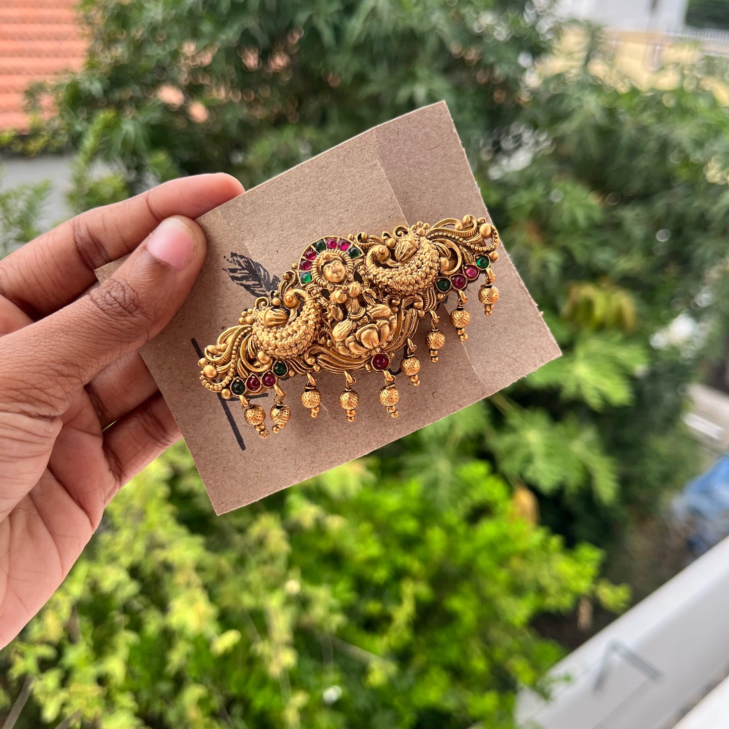 Lakshmi with Peacock Center Clip