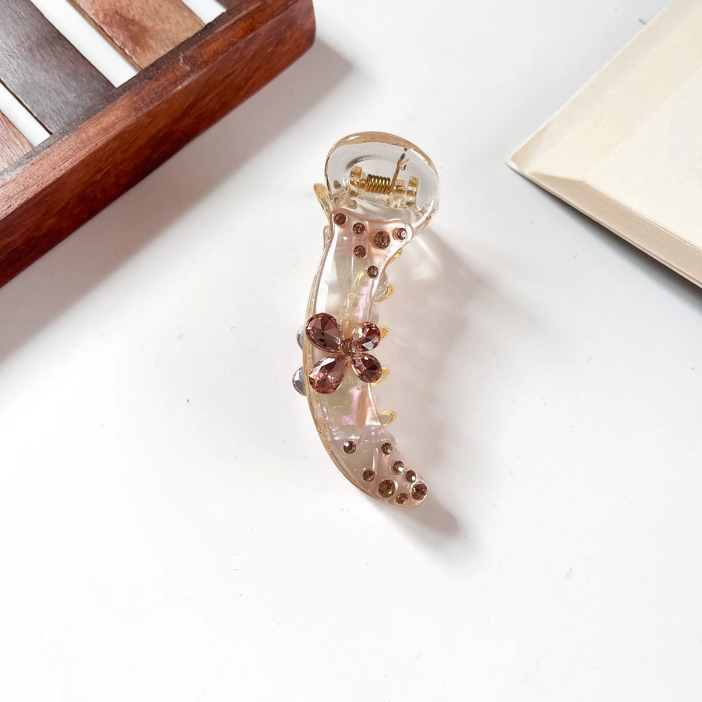 Peach gold crystal banana clip with butterfly centre