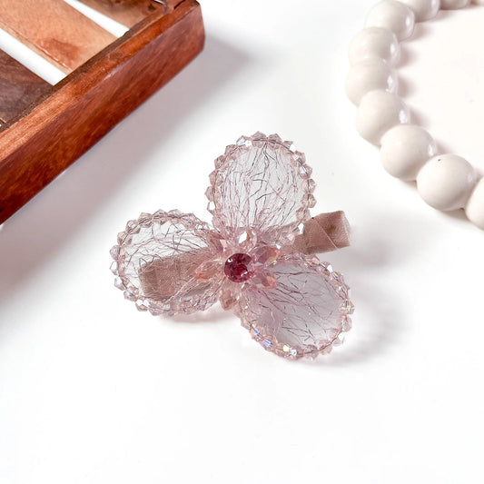 Pink mesh alligator clip with three crystal petal spheres and faceted beads