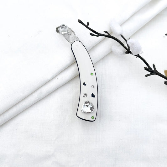 White acrylic lock banana clip with faceted heart gem and rhinestone heart details, 8cm