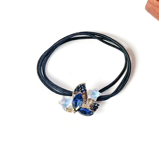 Indigo blue crystal hair tie with navy marquise stones and white star charms, stylish hair rubber band