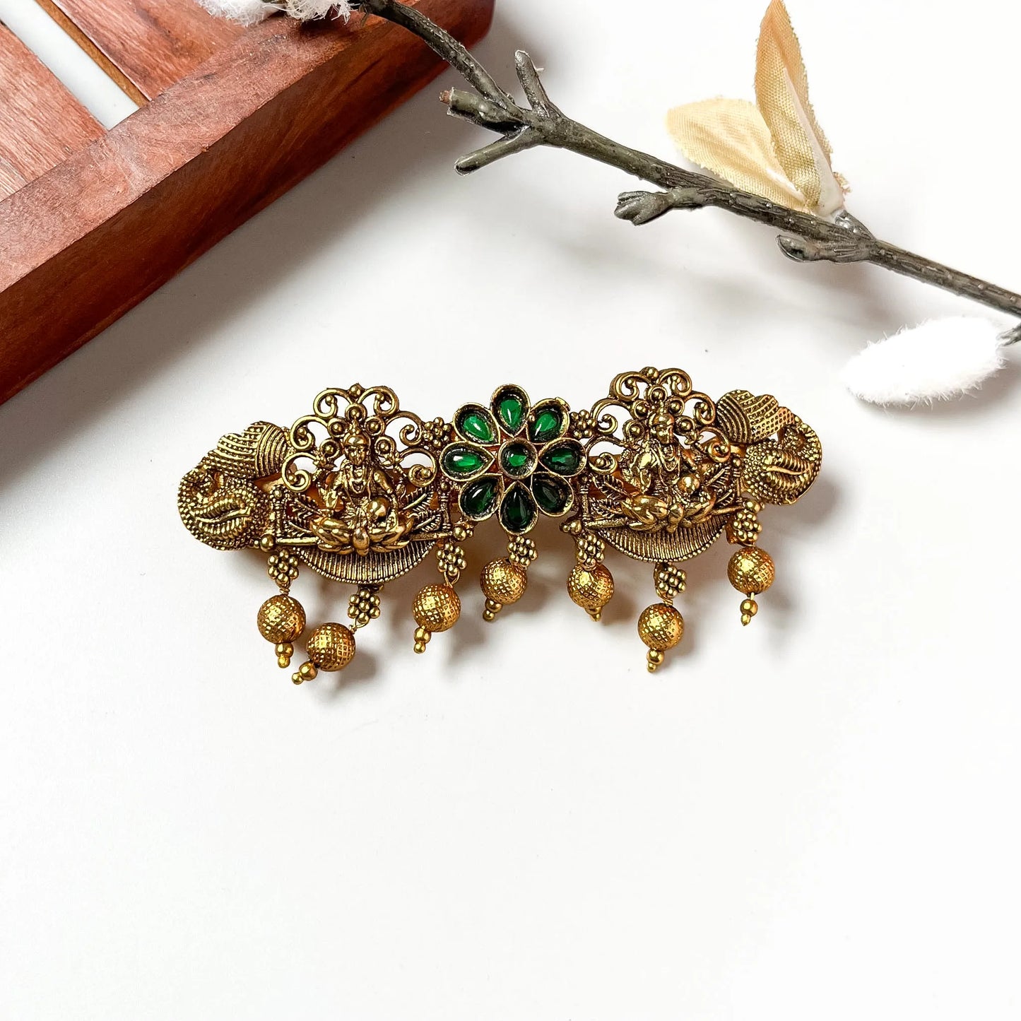 Lakshmi floral gemstone barrette in antique gold with emerald center, 6cm ornate vintage clip