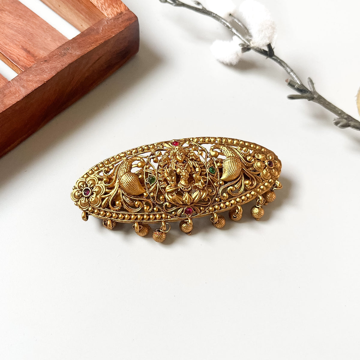 Antique gold Lakshmi centre clip with red and green kemp stones and ghungroo drops