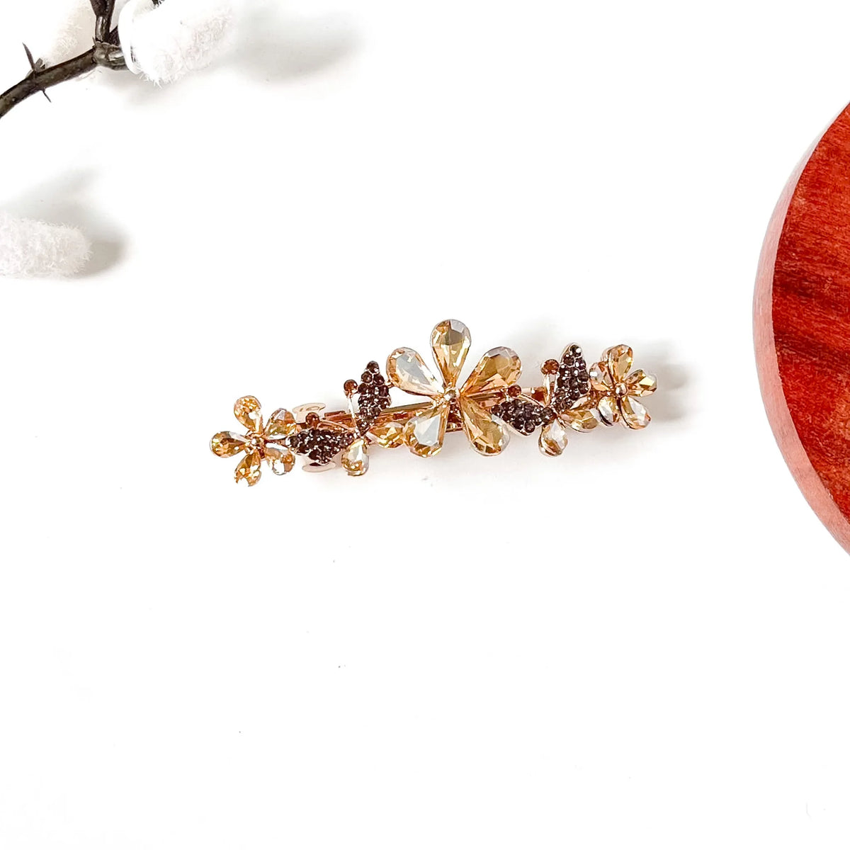 Champagne gold crystal flower hair barrette with rhinestone butterflies, a fancy side hair clip with stones