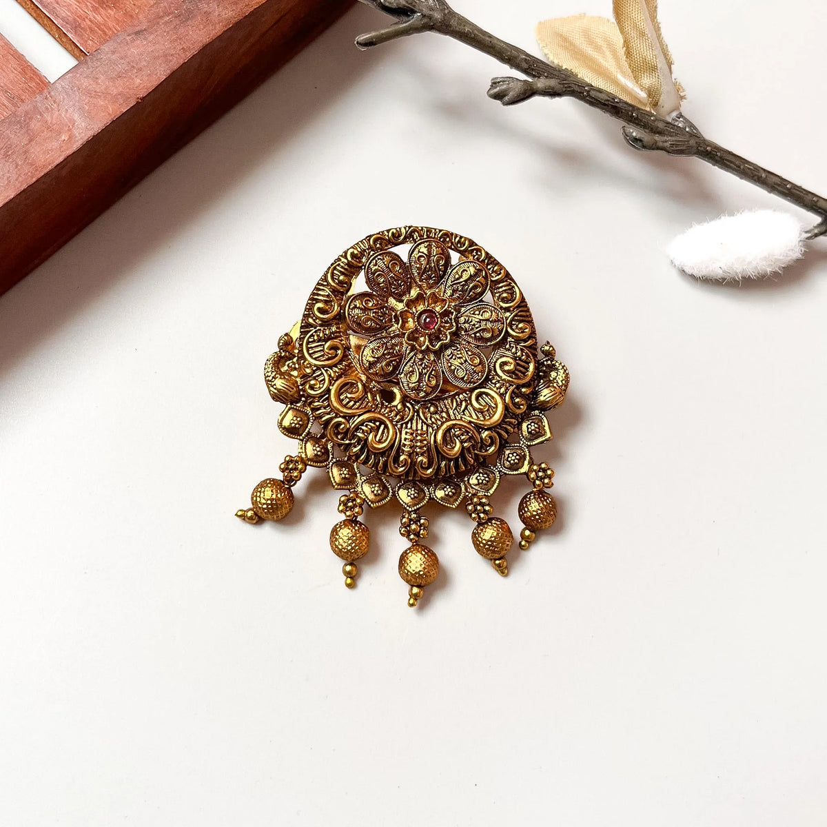 Ruby ornate mandala metal barrette with mandala-patterned medallion and gemstone center, 2.5cm
