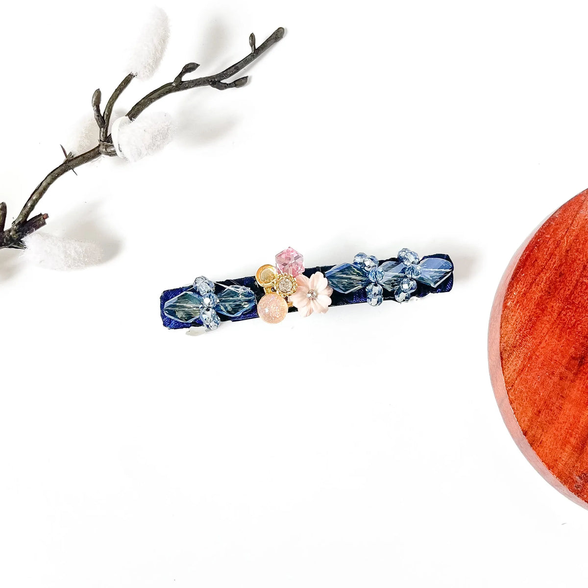 Sapphire navy blue velvet hair clip with light blue crystals and a shell flower, a cute blue hair barrette