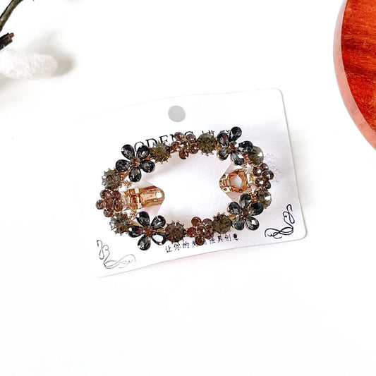 Slate grey crystal flower hair barrette with rhinestone florets, a stone center clip for buns