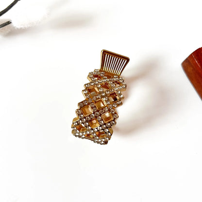 Amber topaz pony cuff with faceted gemstones and gold comb-top mechanism