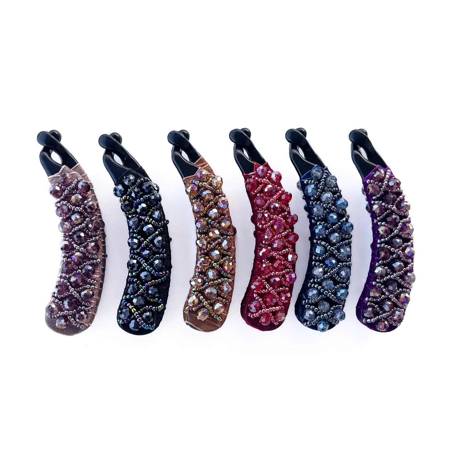 Assorted handcrafted banana clips collection with colorful crystal bead designs