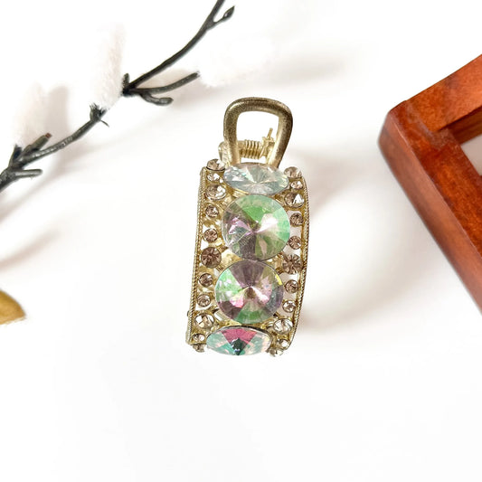 Aurora holographic rhinestone pony cuff with iridescent stones and gold metal band