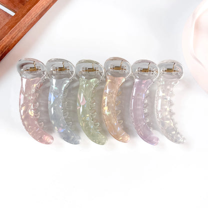 Aurora iridescent banana clips in pink, blue grey, sage green, champagne, lilac and clear for thick and curly hair