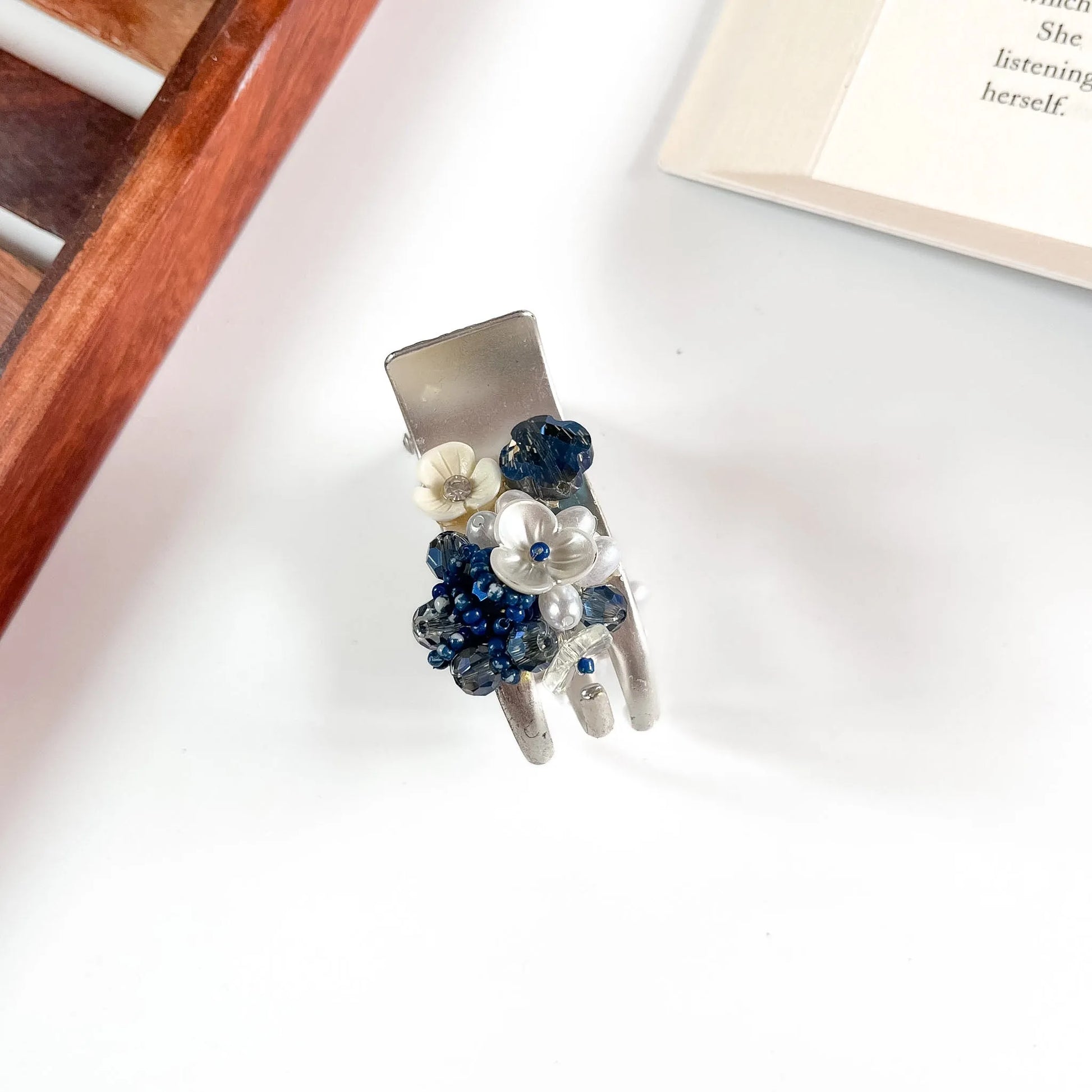 Silver navy beaded flower catch clip for women