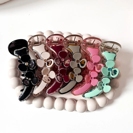 Blossom flower banana hair clips in black, nude, burgundy, pink and mint with rhinestone centres