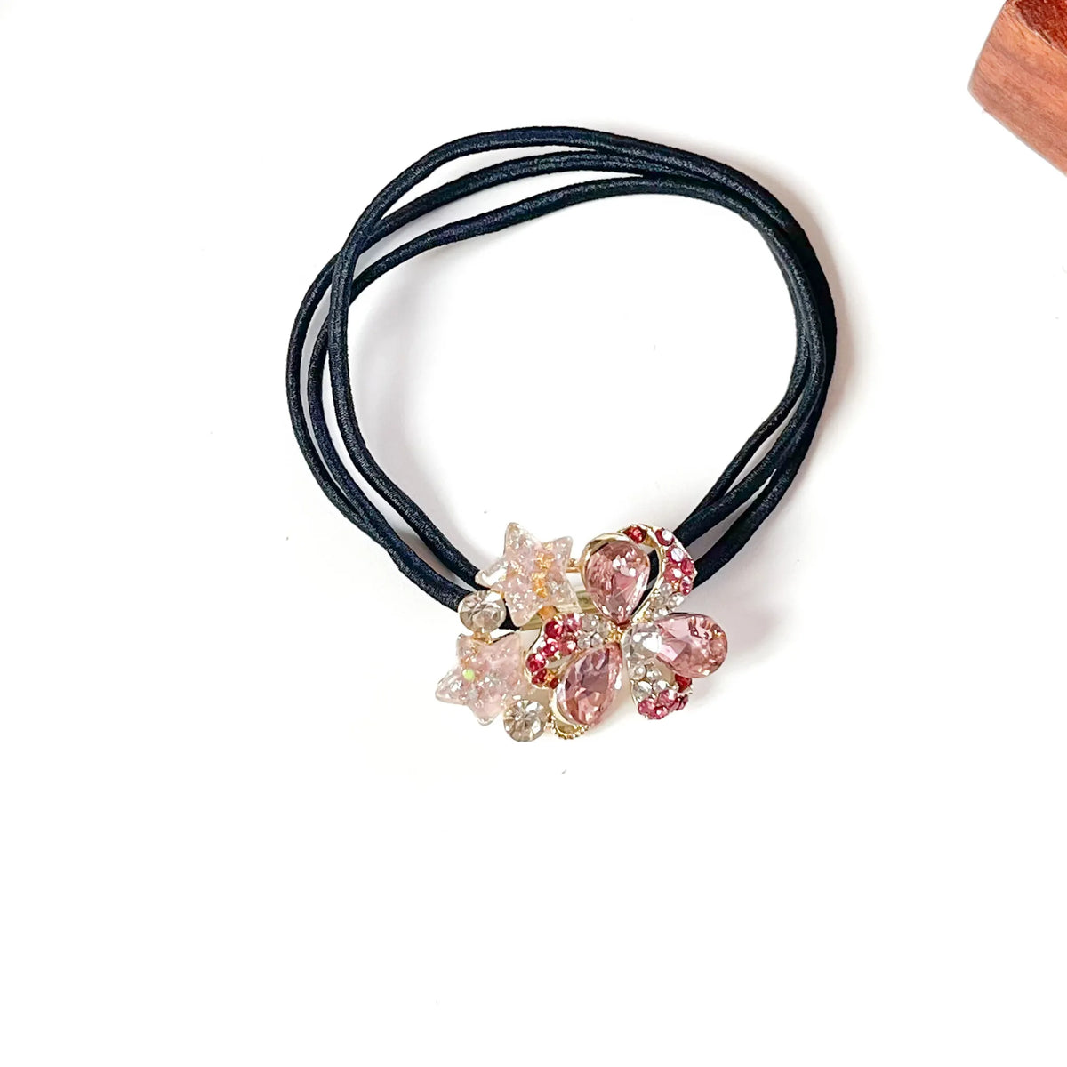 Blossom pink fancy hair rubber band with pink crystal clover and glitter stars, stylish hair tie for women