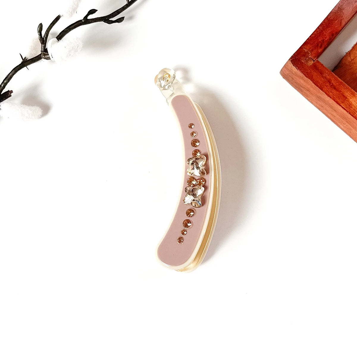 Blush pink banana clutcher with butterfly crystals for women