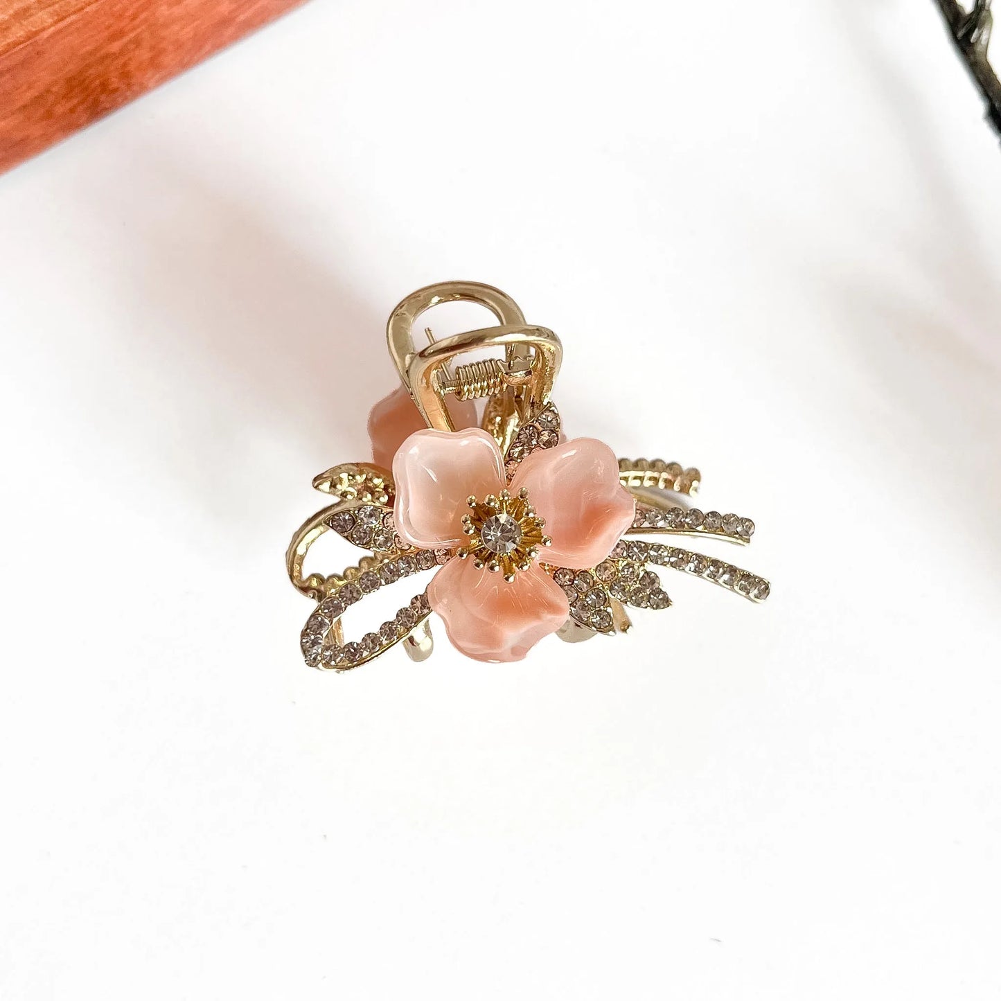 Peach botanical metal claw clip with dimensional acrylic petals, medium luxury clip