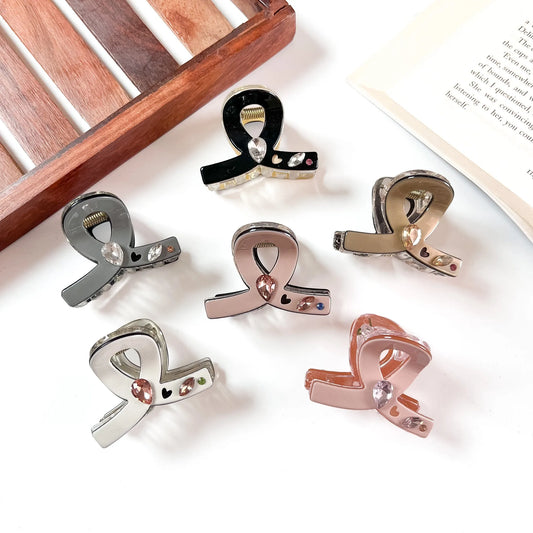 Bow crystal claw clip in six colours with heart and crystal detailing