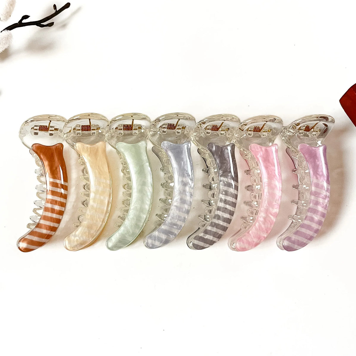 Candy Curve 8 cm small banana hair clips in caramel brown, champagne beige, mint green, sky blue, slate grey, blush pink and lilac purple