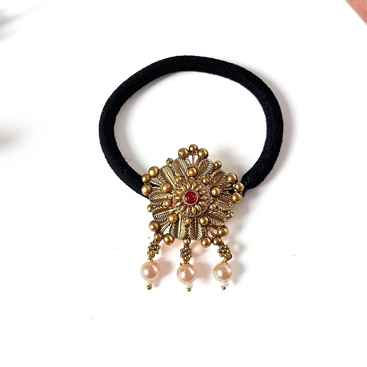 Ruby red gemstone antique gold filigree hair tie with dangling pearl beads on black scrunchie