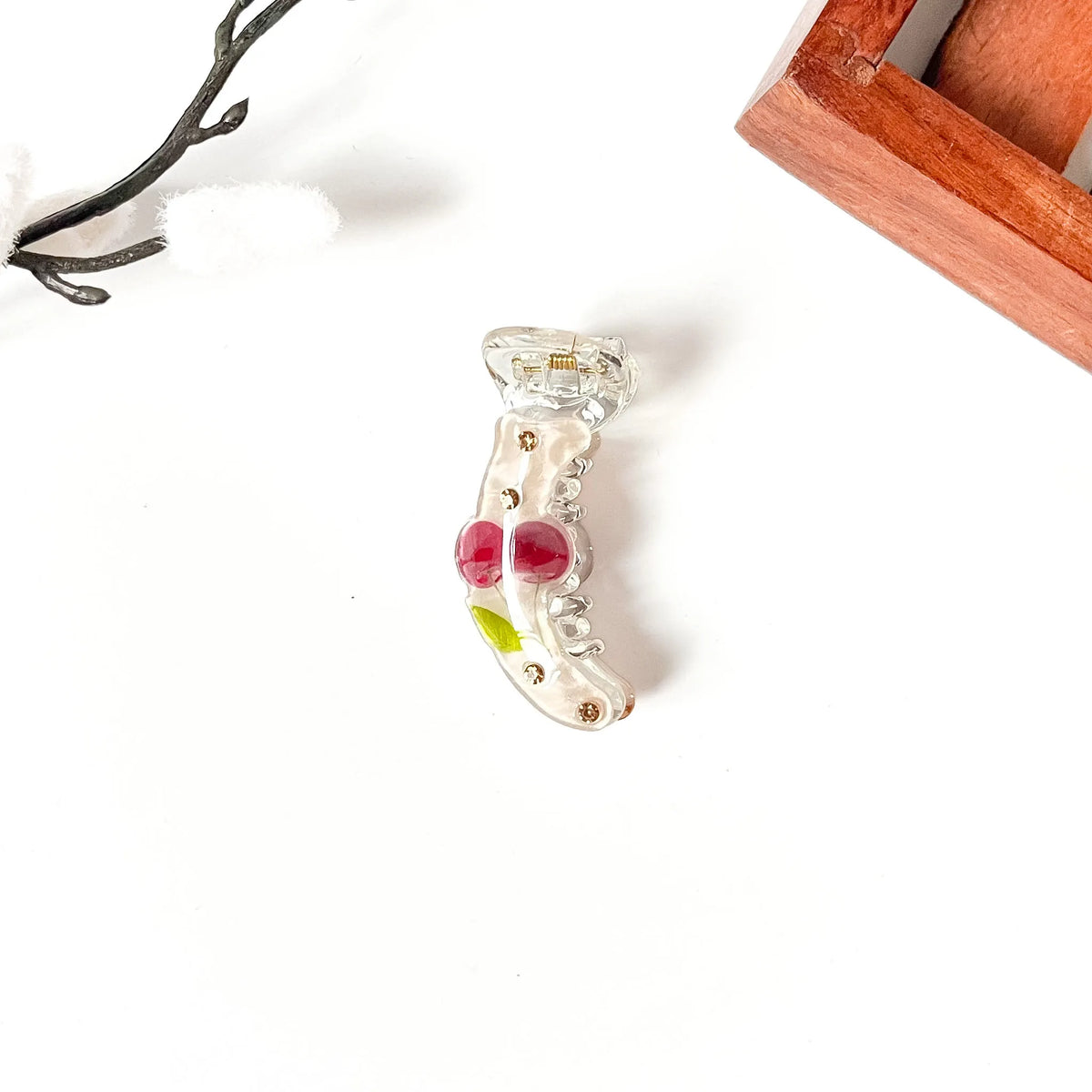 Peach nude pearly small banana clip with red cherries and champagne stones, 5cm