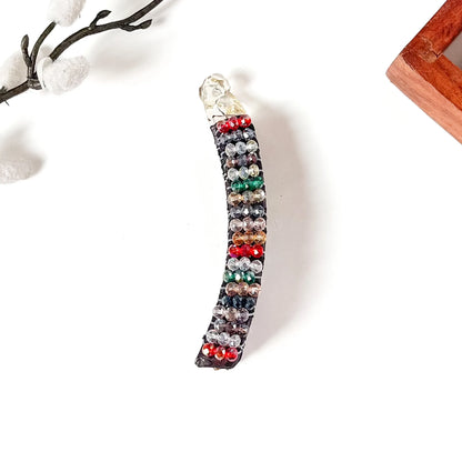 Confetti multicolour crystal banana clip on black base, fancy banana clutcher