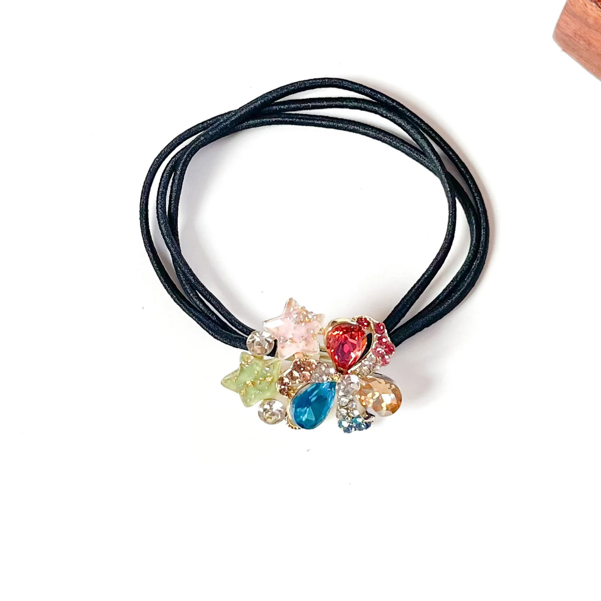 Confetti multicolour fancy rubber band with pink, blue and peach crystals and pastel stars, jewelled hair tie