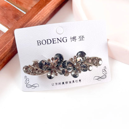 Smoke grey rhinestone floral barrette clip