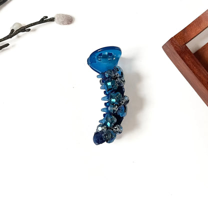 Sapphire blue designer banana clutcher with faceted crystals, 8cm