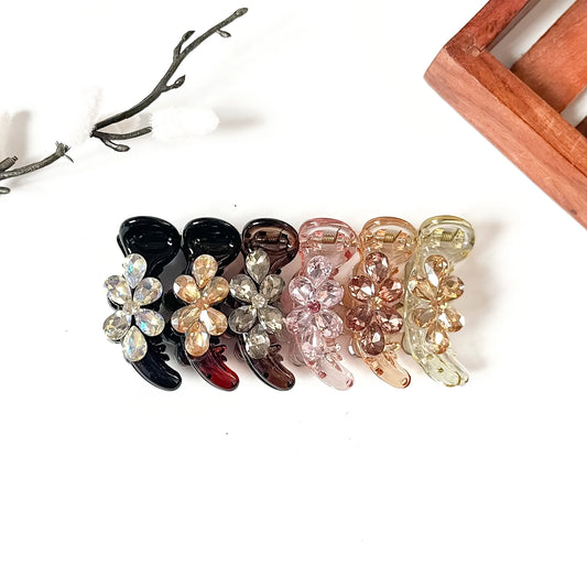 Crystal Daisy 5 cm flower banana clips in noir black, tortoise brown, smoke grey, honey yellow, peach orange and blush pink with rhinestones
