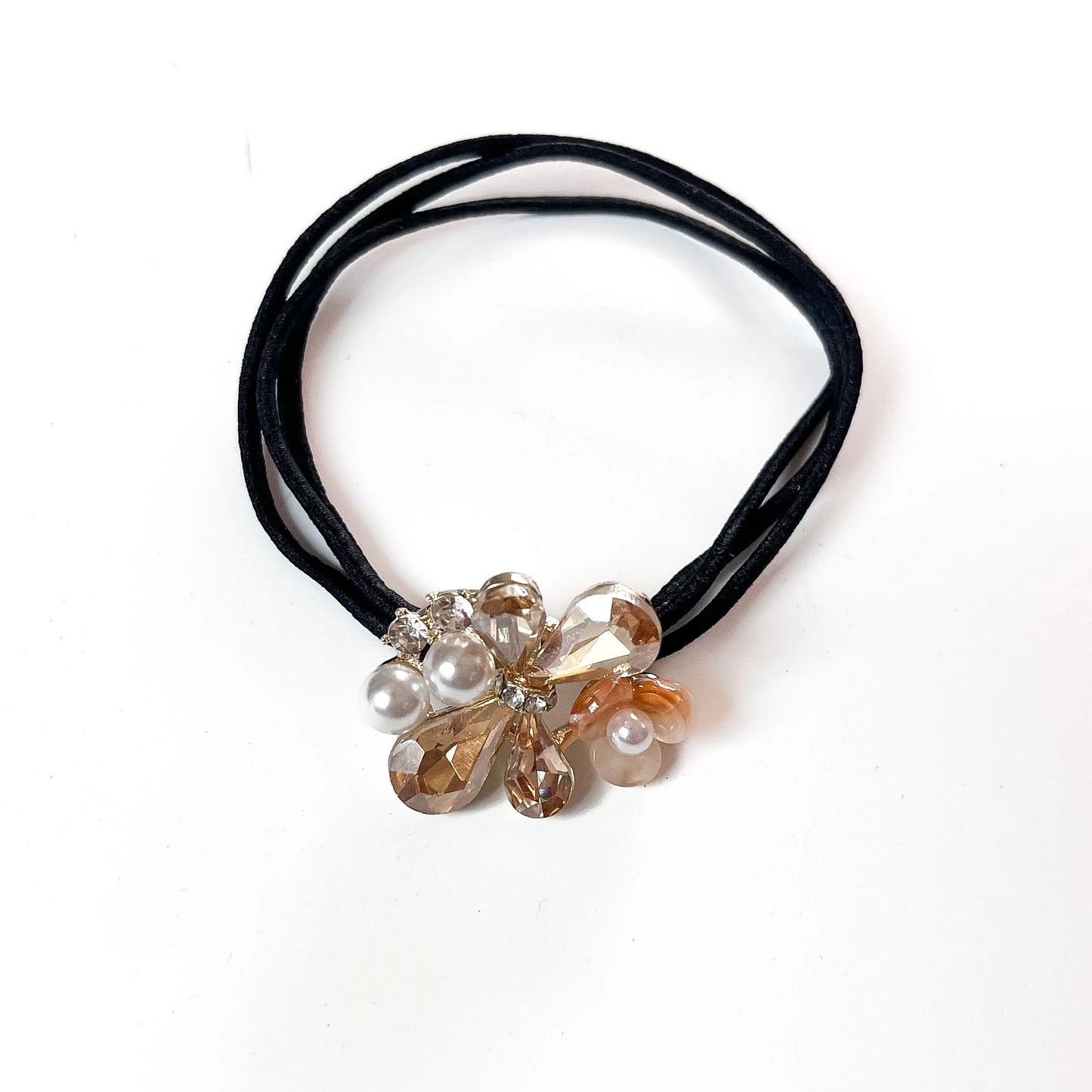 Champagne crystal floral hair tie with pearl and teardrop charm on black elastic band