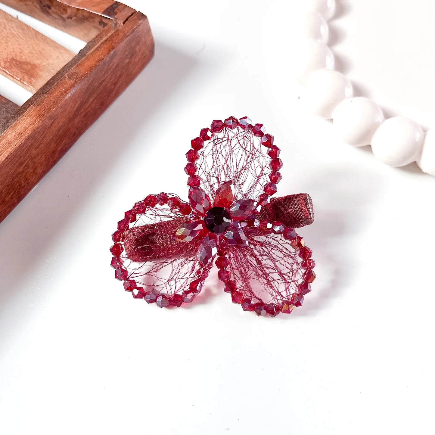 Burgundy mesh alligator clip with three crystal petal spheres and beads