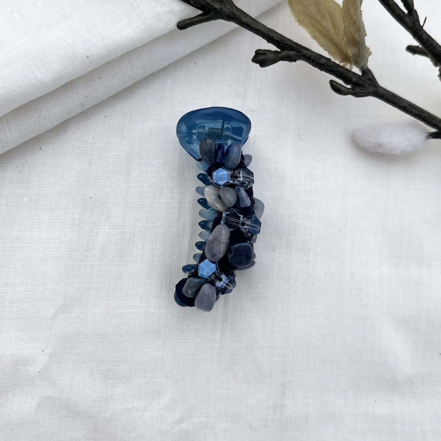 Deep navy blue dainty mini banana clip with matching navy faceted beads creating subtle sparkle.