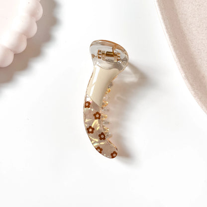 Daisy banana clip cream with brown floral print