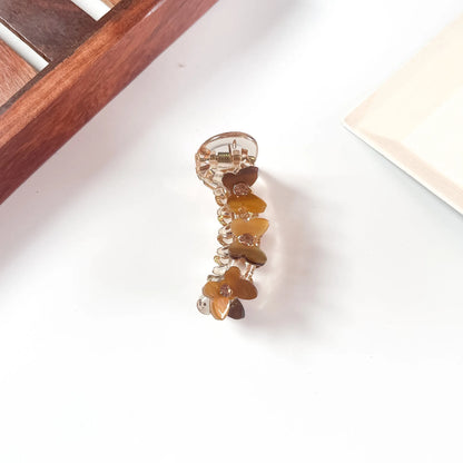 Amber daisy mini banana clip for women
