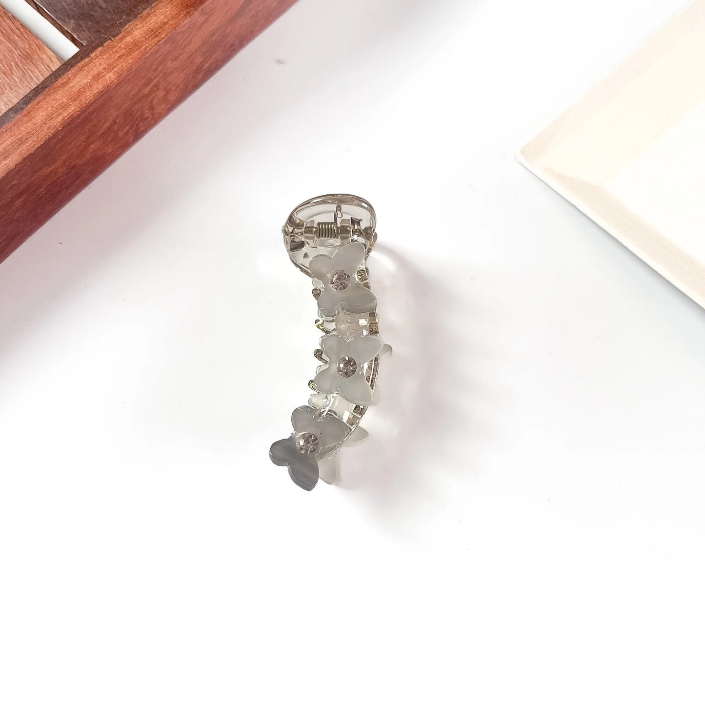 Clear grey daisy mini banana clip for fine hair