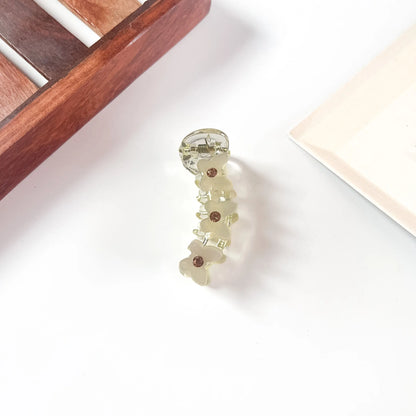 Green Ivory daisy mini banana clip for fine hair