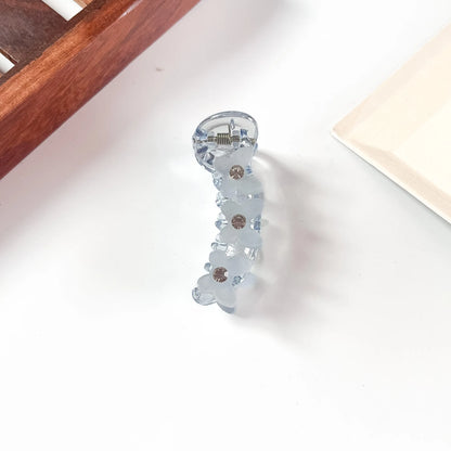 Sky blue daisy mini banana clip for fine hair