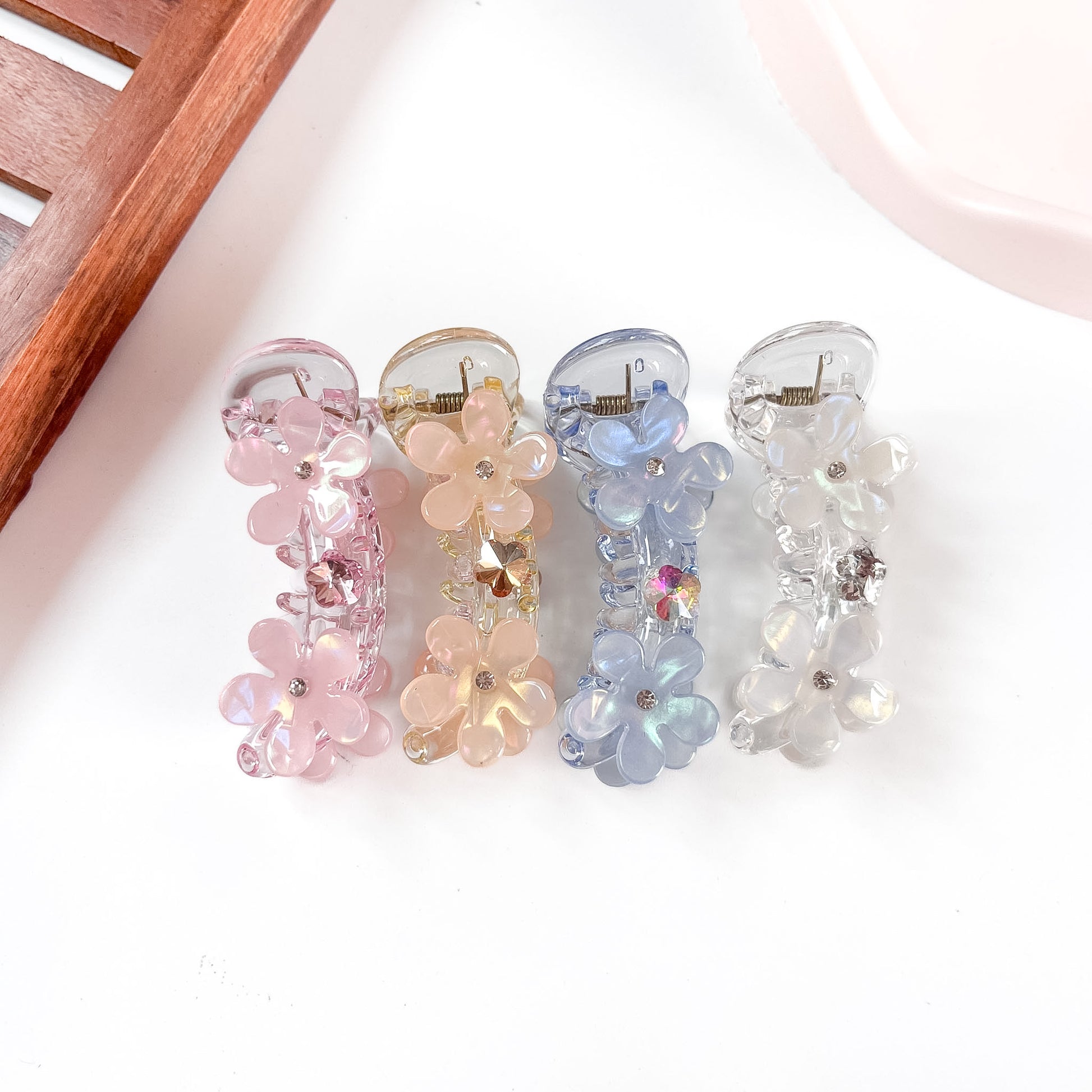 Daisy cluster banana clips in pink, nude peach, periwinkle blue and clear white for thin and short hair