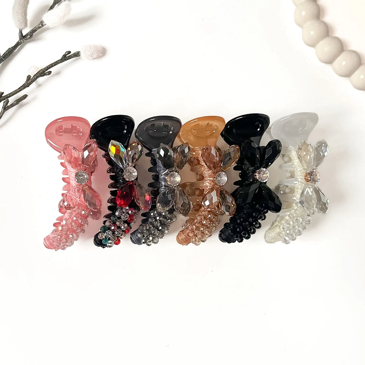 Dewdrop Wing designer rhinestone banana clips in six colours