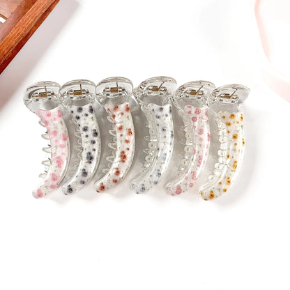 Ditsy floral print banana clips in yellow, pink, grey, lavender, red and blue floral prints