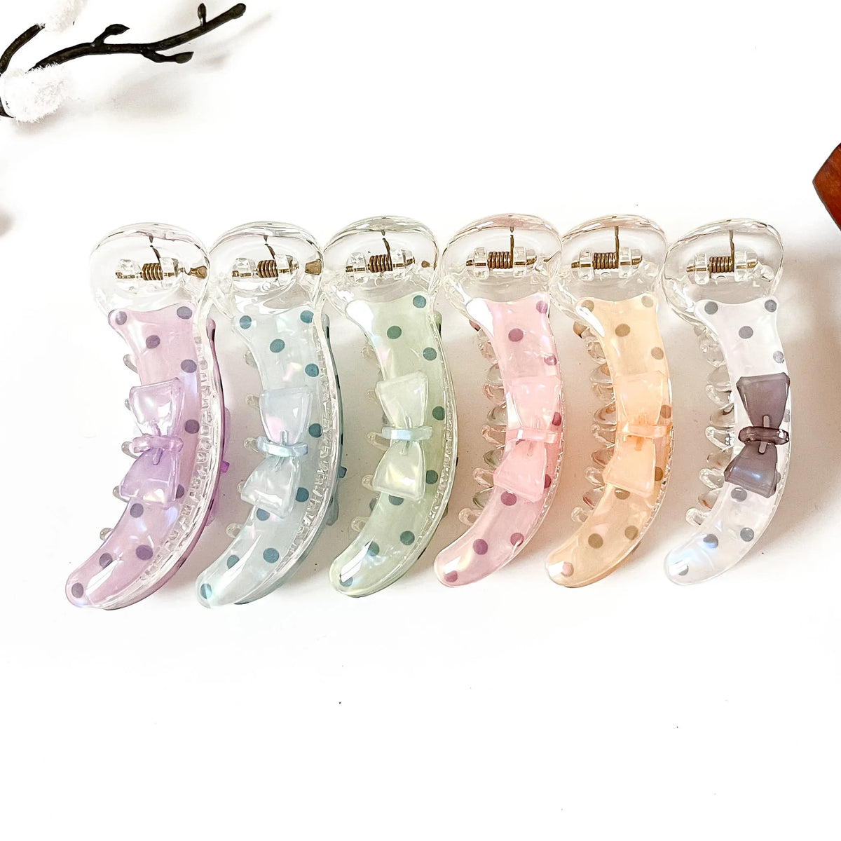 Dotty Bow 8 cm polka dot bow banana clips in lilac purple, sky blue, mint green, blush pink, peach orange and cloud white grey
