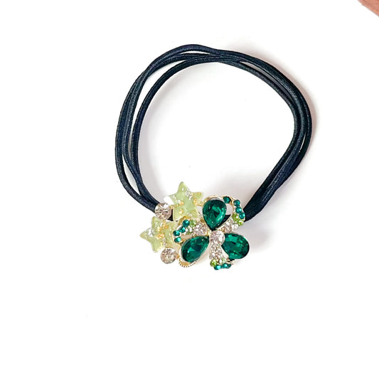 Emerald green fancy rubber band for hair with crystal clover and lime glitter stars on black elastic
