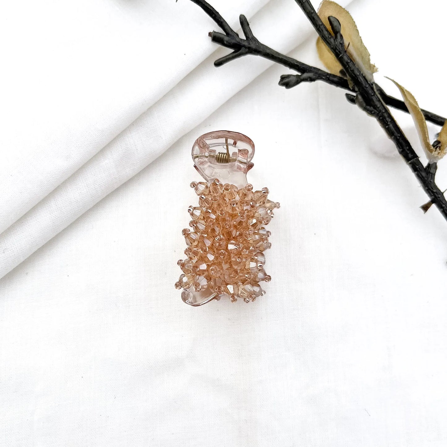 Champagne/gold 5cm banana clip with dense faceted bead cluster, sparkling crystal beads