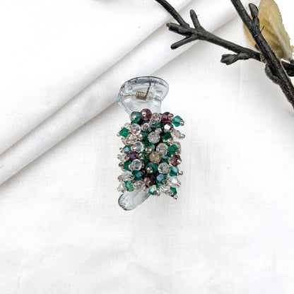 Green 5cm banana clip with dense faceted bead cluster, multi-tone crystal beads