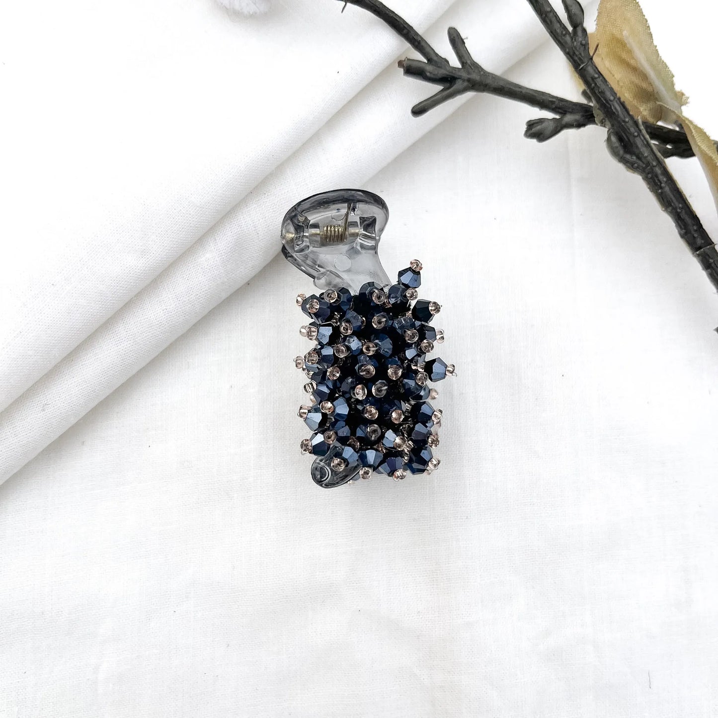Navy/dark blue 5cm banana clip with packed faceted bead cluster, shimmering beads