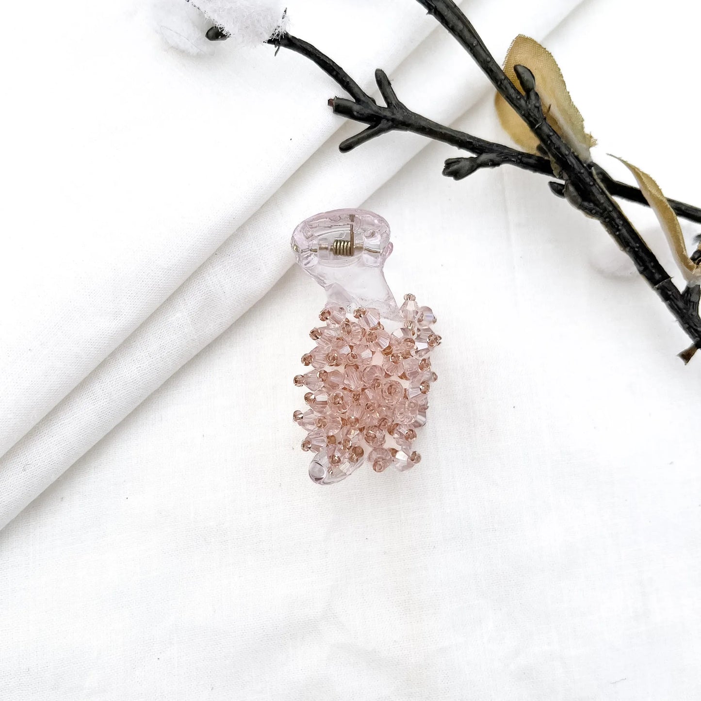 Pink 5cm banana clip with dense faceted bead cluster, shimmering crystal beads