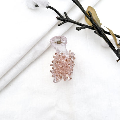 Pink 5cm banana clip with dense faceted bead cluster, shimmering crystal beads