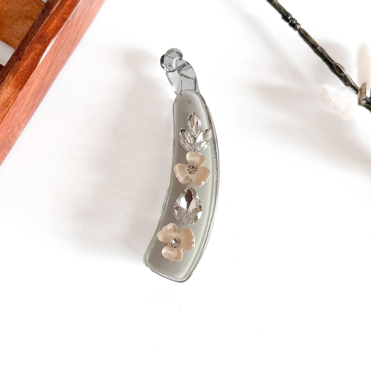 Peach faceted gem lock banana clip with crystalline barrel and jeweled embellishment, 8cm