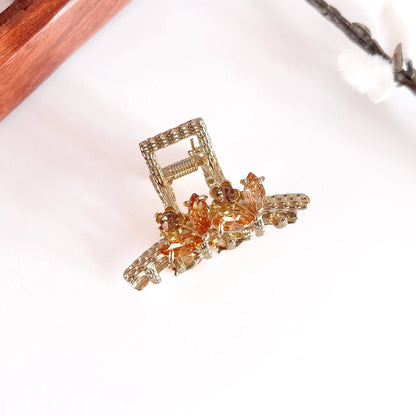Amber orange faceted gemstone metal clip with gold filigree, small metal hair clip with stones