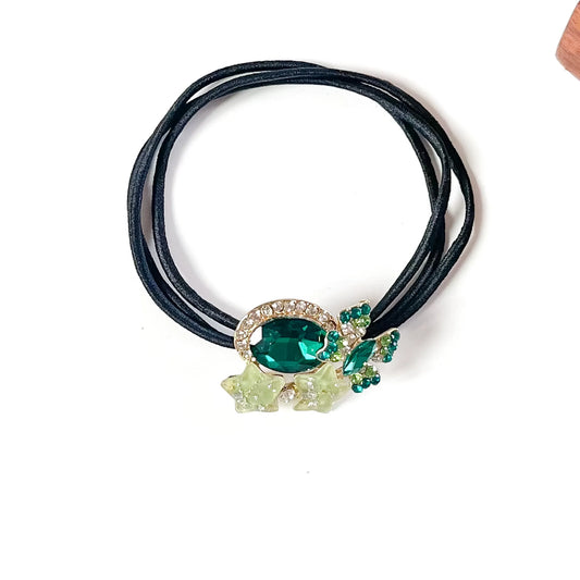 Fern green rhinestone hair tie with emerald oval crystal, green butterfly and lime glitter stars